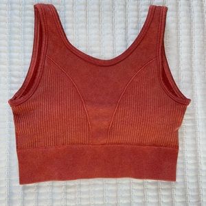 Morera’s long rustic orange sports bra MD